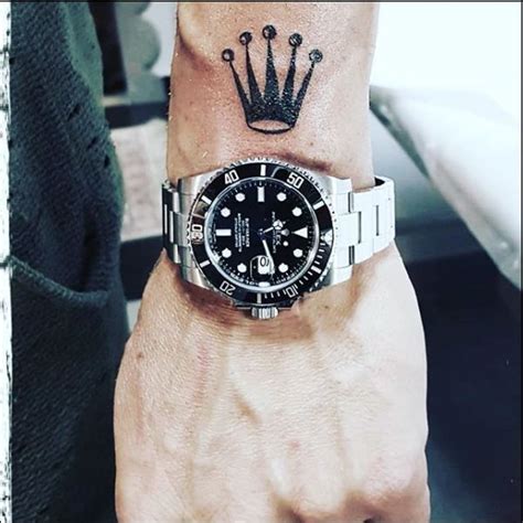 rolex symbol tattoo|rolex wrist tattoos.